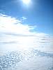 0489-Blue_ice_peeking_from_under_the_snow.JPG