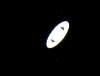 Saturn_through_eyepiece_of_6.5m_scope_and_handheld_camera_1.jpg